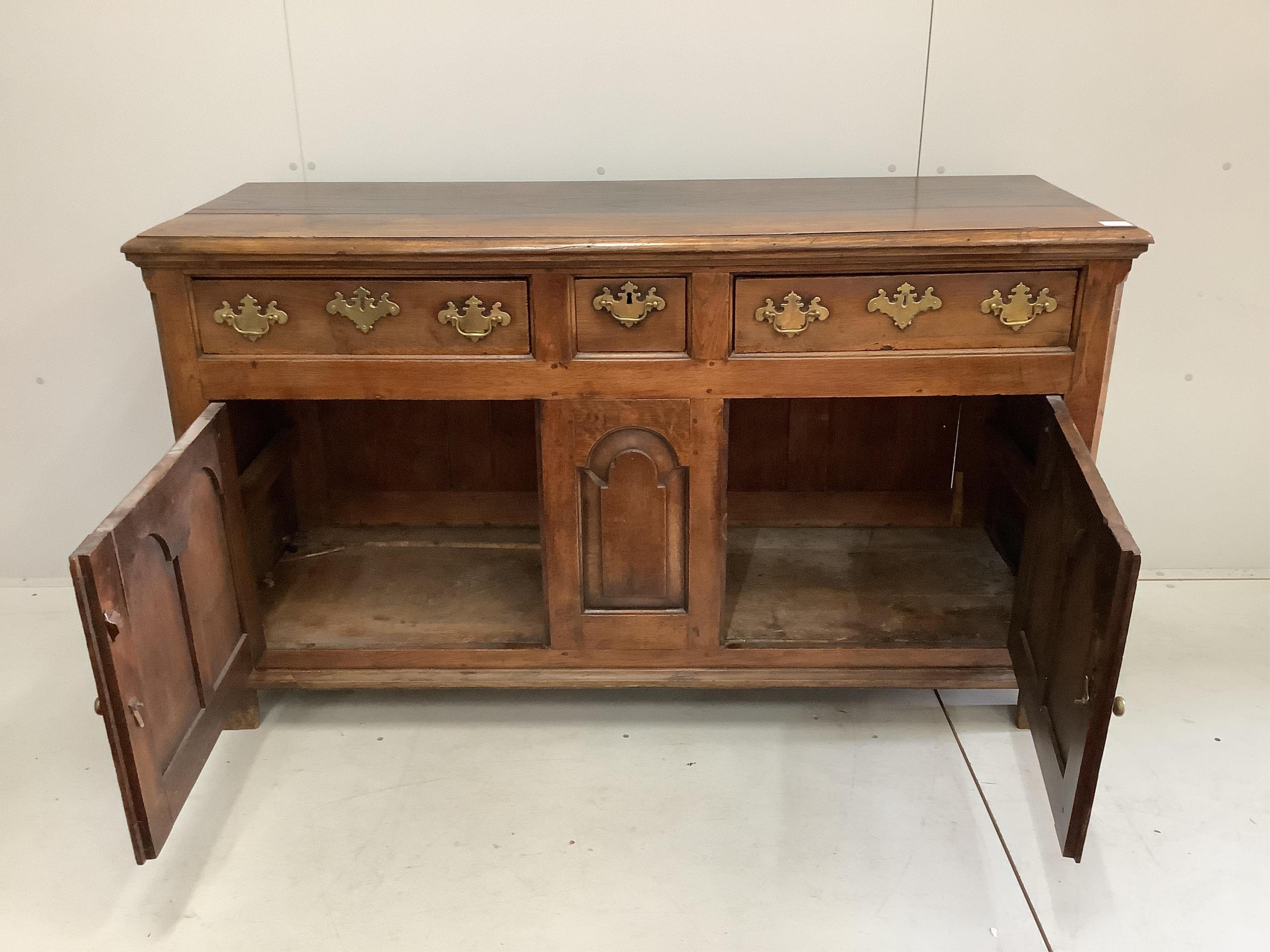 An 18th century Welsh oak low dresser, width 152cm, depth 52cm, height 89cm. Condition - fair